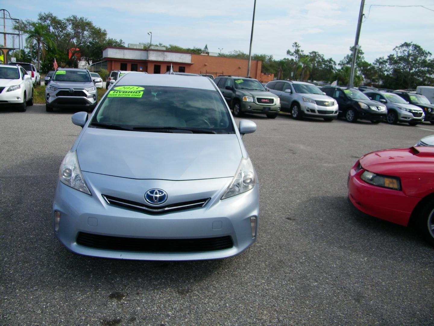 2013 Silver /Beige Toyota Prius V Three (JTDZN3EU5D3) with an 1.8L L4 DOHC 16V HYBRID engine, Continuously Variable Transmission transmission, located at 4000 Bee Ridge Road, Sarasota, FL, 34233, (941) 926-0300, 27.298664, -82.489151 - Photo#3